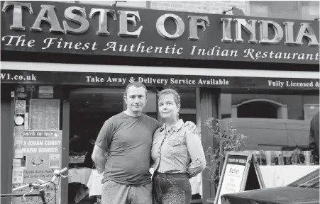  ??  ?? Polish couple Pawel Bednarek, a builder, and Aga Pozniak, who teaches adult training courses, work part-time at Taste of India in London to supplement their incomes. Brexit is expected to cut off the flow of East European workers, who have increasing­ly...