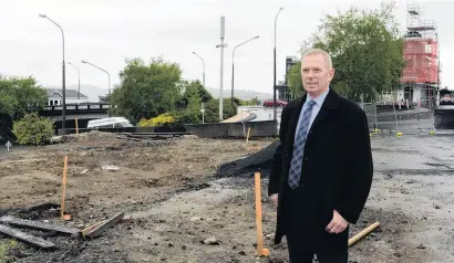 ?? PHOTO: LINDA ROBERTSON ?? Let the building begin . . . Metro Realty Ltd managing partner Mark Stevens stands on the site of the former KFC and Roosters building in Roslyn, which is about to be turned into office space and six town houses.