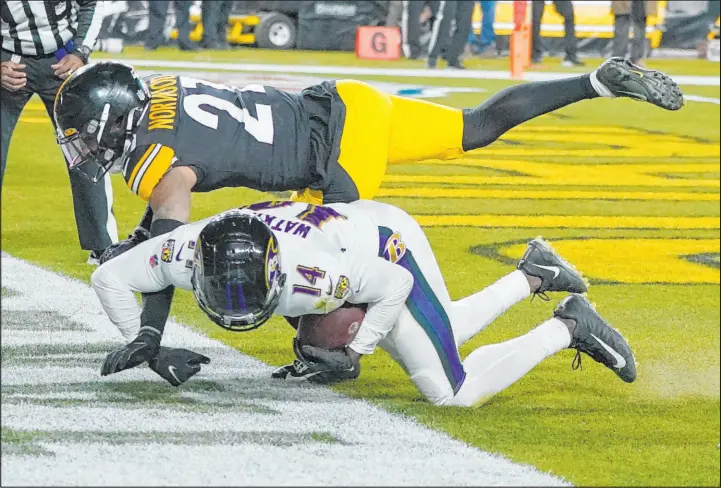  ?? Gene J. Puskar The Associated Press ?? Ravens receiver Sammy Watkins score a TD against the Steelers in the fourth quarter of their Dec. 5 game. The Ravens then failed on a 2-point attempt that would’ve won the game.