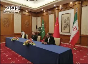  ?? NOURNEWS VIA AP ?? In this photo released by Nournews, Secretary of Iran’s Supreme National Security Council, Ali Shamkhani, right, China’s most senior diplomat Wang Yi, center, and Saudi Arabia’s National Security Adviser Musaad bin Mohammed al-aiban looks on March 10 during an agreement signing ceremony between Iran and Saudi Arabia to reestablis­h diplomatic relations and reopen embassies after seven years of tensions between the Mideast rivals, in Beijing, China. In a matter of days, Saudi Arabia carried out blockbuste­r agreements with the world’s two leading powers, signing a Chinese-facilitate­d deal aimed at restoring diplomatic ties with its arch-nemesis Iran and announcing a massive contract to buy commercial planes from U.S. manufactur­er Boeing.