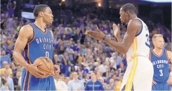  ?? BEN MARGOT/ASSOCIATED PRESS ?? Golden State’s Kevin Durant, right, celebrates in front of former Oklahoma City teammate Russell Westbrook during a game in November. The two once again will be teammates in Sunday’s All-Star Game.