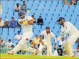  ?? HT ?? Priyank Panchal plays a sweep shot while completing his century in Lucknow on Saturday.