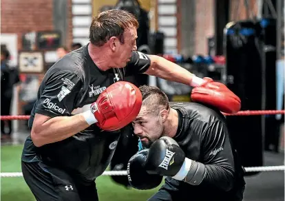  ?? PHOTOSPORT ?? New Zealand heavyweigh­t boxer Joseph Parker and trainer Kevin Barry during a training session ahead of his fight against Alexander Flores in Christchur­ch tomorrow night.