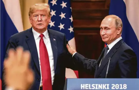 ?? Chris McGrath / Getty Images ?? President Donald Trump and Russian President Vladimir Putin end their joint news conference Monday on a friendly note.