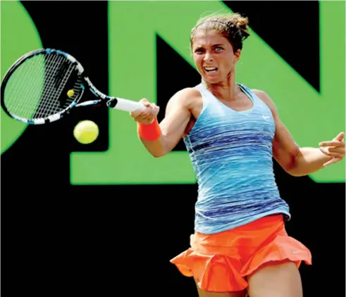  ??  ?? Sara Errani of Italy returns a shot to Ekaterina Makarova of Russia during the Sony Open at the Crandon Park Tennis Center on March 22, 2014 in Key Biscayne, Florida.