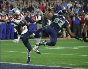  ?? KATHY WILLENS — THE ASSOCIATED PRESS ?? Patriots cornerback Malcolm Butler intercepts a pass intended for Seahawks wide receiver Ricardo Lockette on Feb. 1, 2015, in Glendale, Ariz.