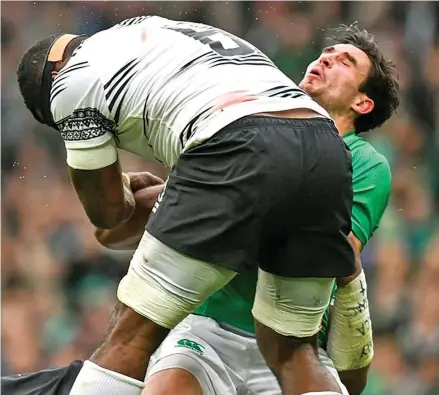  ?? ?? A high tackle by Albert Tuisue against Ireland that saw him get a red card.