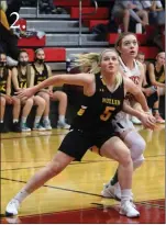  ??  ?? 2. Hanna Marshall of Mullen boxes out Shaylyn Safranek of Anselmo-Merna going for a rebound in the first half of the Broncos 43-33 win.