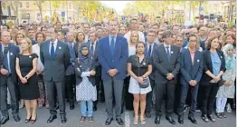  ?? FRANCISCO SECO/AP ?? Spain’s King Felipe VI, center, takes part Saturday in a public demonstrat­ion in Barcelona condemning attacks that killed 15 people and wounded over 120 earlier this month.