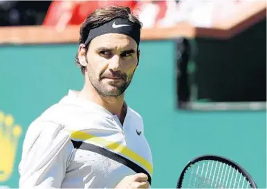  ?? HARRY HOW/GETTY IMAGES ?? Roger Federer of Switzerlan­d has won the Miami Open three times in his career and owns 20 Grand Slam titles. At 36, he says he not ready to ease into retirement. is