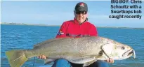  ??  ?? BIG BOY: Chris Schoultz with a Swartkops kob caught recently