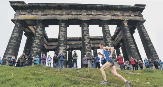  ??  ?? Sunderland Harrier Nathan Reed racing to victory in last year’s Penshaw Hill Race. Picture by Kevin Brady.