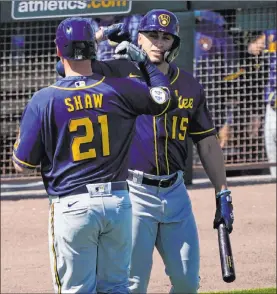  ?? Matt York The Associated Press ?? Travis Shaw is back in Milwaukee with a chance to get his old starting job back at third base. Shaw’s deal pays him bonus money for getting more at bats.