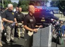  ?? THE INDIANAPOL­IS STAR VIA AP ?? Noblesvill­e Police Lt. Bruce Barnes talks to reporters during a news conference regarding a school shooting at Noblesvill­e West Middle School on Friday, in Noblesvill­e, Ind. A male student opened fire at the suburban Indianapol­is middle school wounding...