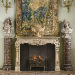  ??  ?? ABOVE A rare French 18th-century rococo fireplace, £POA, Westland London. BELOW LEFT An 18th-century marble fireplace is dressed for the season, £POA, Westland London.