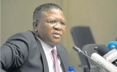  ?? / TREVOR SAMSON ?? Police Minister Fikile Mbalula says the law should act harshly against the man who was filmed hitting a woman with a spanner several times over the head.