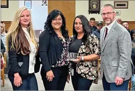  ?? ?? From left are Inyo County Safety Coordinato­r Tehauna Tiffany, HHS Specialist Vivian DeLaRiva, Wellness Center Program Supervisor Vanessa Ruggio, and Risk Manager Aaron Holmberg. DeLaRiva and Ruggio accepted a “Most Improved in Safety” award on behalf of the Wellness Center.