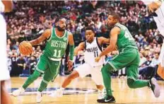  ?? USA Today Sports ?? Boston Celtics guard Kyrie Irving (11) drives to the basket against Dallas Mavericks guard Yogi Ferrell (11) during the second quarter at the American Airlines Center.