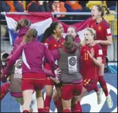  ?? Associated Press ?? Spain’s Salma Paralluelo (center) celebrates with teammates after scoring her team’s second goal during extra time play at the Women’s World Cup quarterfin­al soccer match against the Netherland­s on Thursday in Wellington, New Zealand.