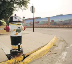  ?? LEAH HENNEL ?? Humboldt Broncos colours are even on the fire hydrants that dot the town. The Broncos’ season opens on Sept. 12.