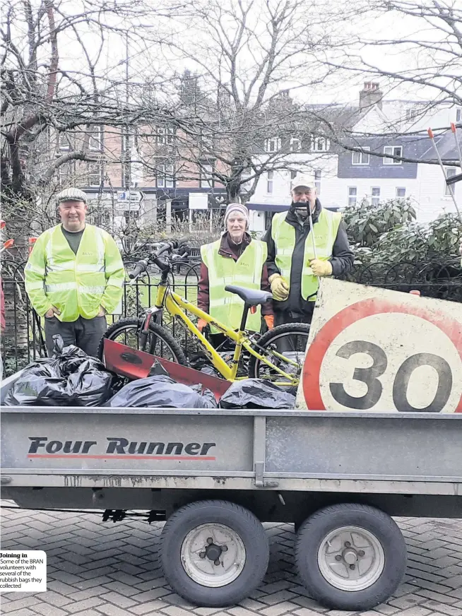  ??  ?? Joining in Some of the BRAN volunteers with several of the rubbish bags they collected