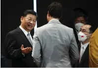  ?? ?? Canada Prime Minister Justin Trudeau talks with Chinese President Xi Jinping after taking part in the closing session of the G20 Leaders Summit in Bali, Indonesia. — ap