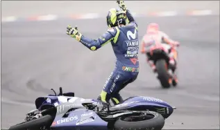  ?? PICTURE: EPA ?? Italy’s Valentino Rossi reacts after colliding with Spanish MotoGP rider Marc Marquez during the Grand Prix of Argentina last weekend.