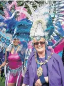  ??  ?? Mayor of Charnwood Coun Pauline Ranson having fun as a Caribbean carnival dancer. Picture courtesy of Charnwood Arts.