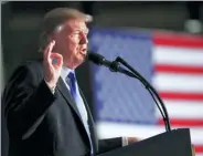  ??  ?? President Donald Trump speaks at Fort Myer in Arlington, Virginia, on Monday.