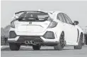  ?? HONDA PHOTOS ?? The Type R’s giant rear spoiler creates downforce — and stares.