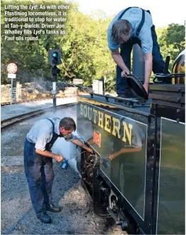  ??  ?? Lifting the Lyd : As with other Ffestiniog locomotive­s, it is traditiona­l to stop for water at Tan-y-Bwlch. Driver Jon Whalley fills Lyd’s tanks as Paul oils round.