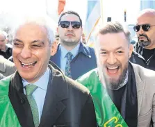  ?? PHOTO: PA ?? Appearance: Conor McGregor joins Mayor of Chicago Rahm Emanuel (left) during the parade in Chicago.