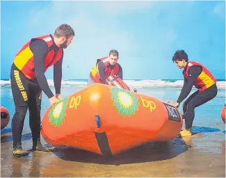  ??  ?? Surf lifesavers at Kariotahi — on the west coast near Waiuku — were among 2500 volunteer lifeguards at beaches in the northern region over summer.