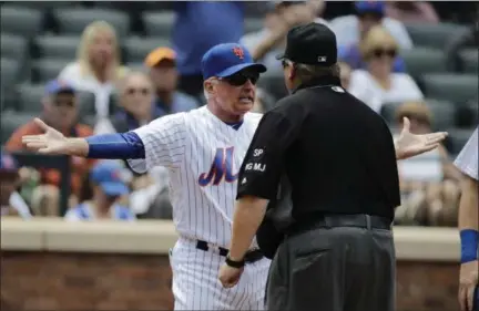  ?? FRANK FRANKLIN II — THE ASSOCIATED PRESS ?? New York Mets manager Terry Collins (10) argues a call with umpire Fieldin Culbreth during the fourth inning of a baseball game against the Milwaukee Brewers Thursday in New York. Collins was ejected from the game.