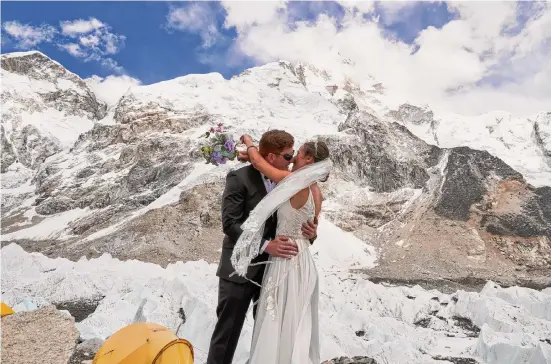  ?? Courtesy Florin Lupse/New York Times ?? Austin and Iulia O’Reilly went on a nine-day trek to the Mount Everest base camp for their wedding. It was cheaper than an American wedding.