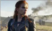  ?? MARVEL STUDIOS/DISNEY ?? Scarlett Johansson in a scene from the long-delayed “Black Widow.” Disney announced the film’s release date as July 9,.