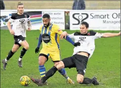  ?? Picture: Ken Medwyn ?? Jono Richardson slides in for Faversham