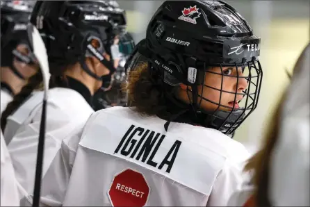  ?? The Associated Press ?? Jade Iginla looks on from the bench during a national women’s under-18 inter-squad game in Calgary, May 27.