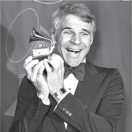  ?? LENNOX MCLENDON / THE ASSOCIATED PRESS FILES ?? Steve Martin was happy to win a Grammy Award for best comedy recording in 1979.