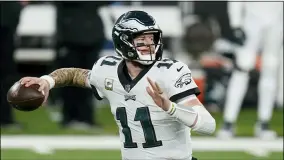  ?? SETH WENIG - THE ASSOCIATED PRESS ?? Philadelph­ia Eagles’ Carson Wentz throws a pass against the New York Giants Sunday, Nov. 15, 2020, in East Rutherford, N.J.