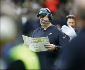  ?? BUTCH DILL — THE ASSOCIATED PRESS ?? Philadelph­ia Eagles head coach Doug Pederson watches play against the New Orleans Saints in the first half of Sunday’s playoff loss in New Orleans. Pederson could be facing quite a bit of roster turnover at the start of next season after consecutiv­e playoff appearance­s.