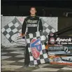  ?? COURTESY RICH KEPNER ?? Ryan Lilick poses in victory lane after his first Modified win at Grandview on Sept. 4.