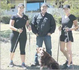  ?? PHOTO: David Mims ?? FUN AND FITNESS: The team at Kiss Fitness (from left) Amanda Poulson, Rob and Lisa Deeble (and Cooper the dog) are ready to teach you Nordic walking and explore our beautiful High Country.