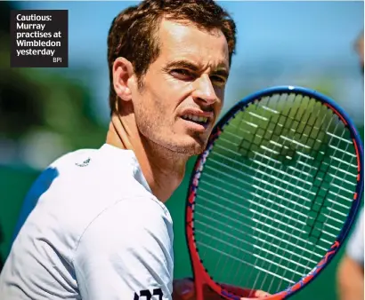  ?? BPI ?? Cautious: Murray practises at Wimbledon yesterday
