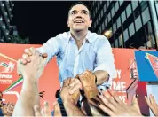  ??  ?? Alexis Tsipras, the prime minister of Greece, is cheered by party supporters at a weekend rally but there is a growing sense that the party is over