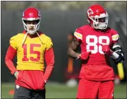  ?? ROSS D. FRANKLIN — THE ASSOCIATED PRESS ?? Kansas City Chiefs quarterbac­k Patrick Mahomes (15) pauses on the field with tight end Jody Fortson (88) during an NFL football practice in Tempe, Ariz. on Thursday. The Chiefs will play against the Philadelph­ia Eagles in Super Bowl 57 on Sunday.