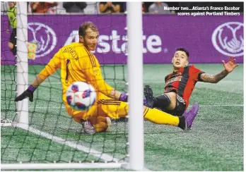  ??  ?? Number two...Atlanta’s Franco Escobar scores against Portland Timbers