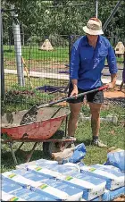  ?? Coonabarab­ran. PHOTO: SUPPLIED ?? Australian Labor Party candidate, Jack Ayoub putting up fencing at the newly installed “Stop and Play” park in his home town of