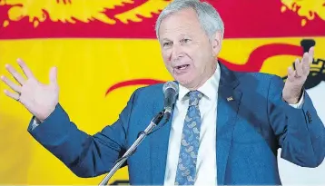  ?? ANDREW VAUGHAN / THE CANADIAN PRESS ?? New Brunswick PC Leader Blaine Higgs addresses supporters at his campaign office in Quispamsis, N.B., on Monday.