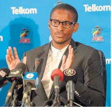  ?? /Lee Warren/Gallo Images ?? Now you see him: Rhulani Mokwena talks to the media when he was Pirates coach now he is rumoured to be on a coaching course in Europe.